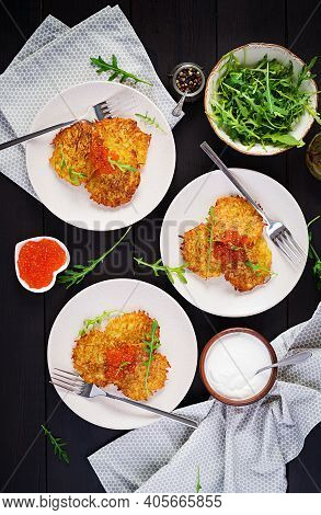 Fried Potato Pancakes With Red Caviar And Sour Cream, Fritter, Roesti. Traditional Delicious Food, L