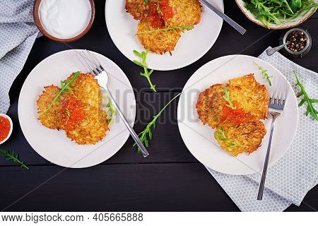 Fried Potato Pancakes With Red Caviar And Sour Cream, Fritter, Roesti. Traditional Delicious Food, L