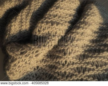Knitted Product From Bulky Polyacrylic Yarn Of Beige Or Brown Color. Lush Machine Box. Option For A 