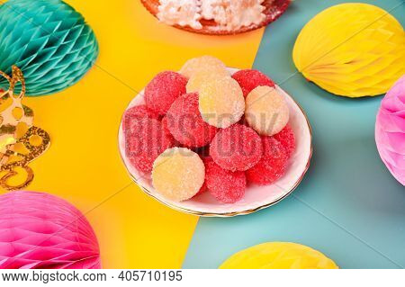 Baked Castagnole. On A Colored Background Traditional Sweet Pastries During The Carnival Period In I