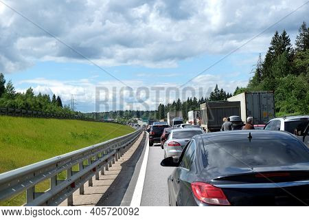 Moscow Suburban, Russia - June The 6th, 2016: Traffic Jam On Countryside Highway. Long Line Of Many 