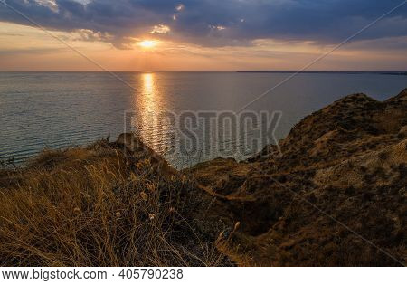 Picturesque Sunset Landscape Of Stanislav Clay Mountains And Canyons Above Dnipro River Bay Near The