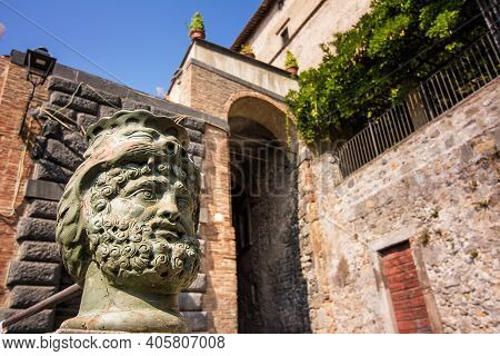 Detail Of A Sculpture Along The Alleys Of The Historic Center Of Bolsena, Italy