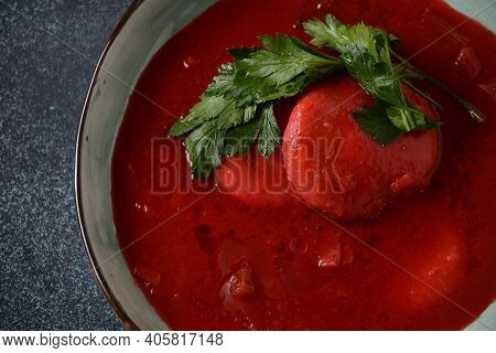 Hot Red Beet Kubbeh Soup, A Famous Middle Eastern Dumplings Soup Dish, Served In A Bowl. A Jewish-ir