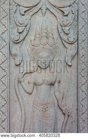 The Angel Sculpture On The Wall Of Anciient Khmer.by  This Angle Is Called Mrs. Apsorn. Which  The A