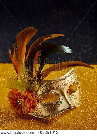 Festive, Colorful Mardi Gras Or Carnivale Mask With Feathers On Golden Background. Venetian Masks. P
