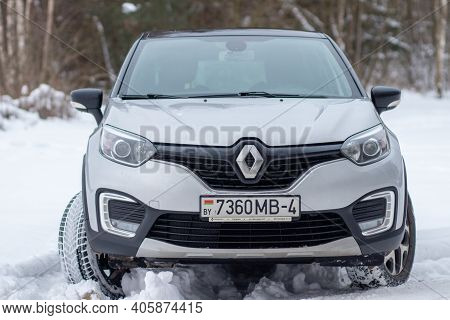 Grodno, Belarus-01.31.2021: Renault Capture Or Renault Captur Suv On A Winter Road Against The Backg