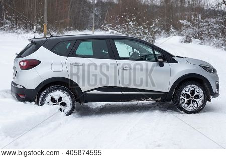 Grodno, Belarus-01.31.2021: Side View Of A Renault Capture Or Renault Captur Suv On A Winter Road Ag