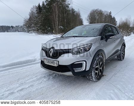 Grodno, Belarus-01.31.2021: Renault Capture Or Renault Captur Suv On A Winter Road Against The Backg