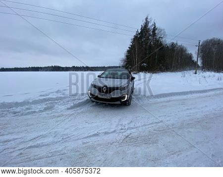 Grodno, Belarus-01.31.2021: Renault Capture Or Renault Captur Suv On A Winter Road Against The Backg