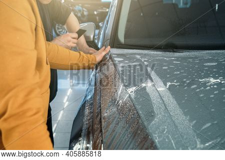 Installing Ppf Or Paint Protection Film On Car As Protective Polymer Skin From Scratches And Rock Ch