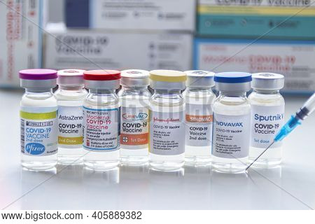 Calgary, Alberta. Canada. Jan 31, 2021. Several Covid-19 Vaccines Brands On Vials Bottles With A Syr