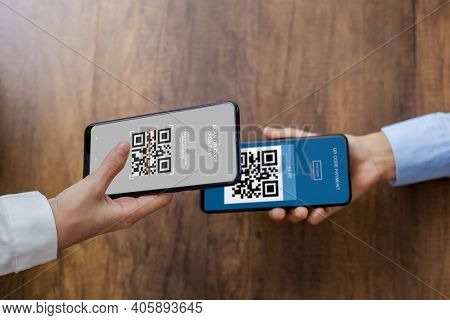 Qr Code Payment, Online Shopping, E Wallet, Cashless Technology Concept. Human Hand Paying With Qr C