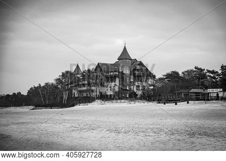 Beautiful Landscape On A Winter Day On The Beach In Łeba In Poland With A Historic Hotel