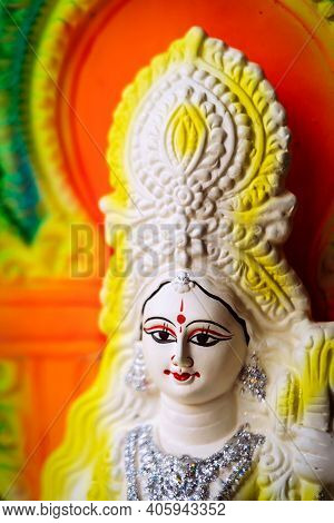 Idol Of Goddess Saraswati Painted In White And Yellow Colour On Basant Panchami Utsav. Swaraswati Is