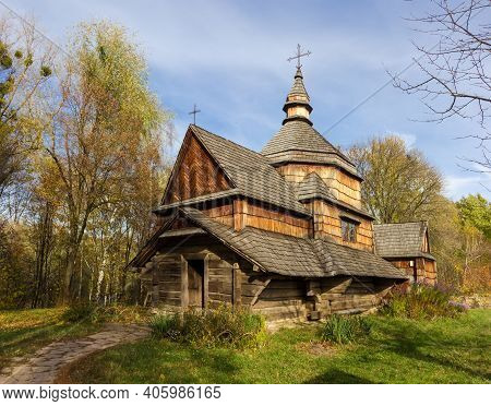 Old Wooden Church With Walls And Roof Covered With Wooden Shingles, Octal Central Dome Built In The 