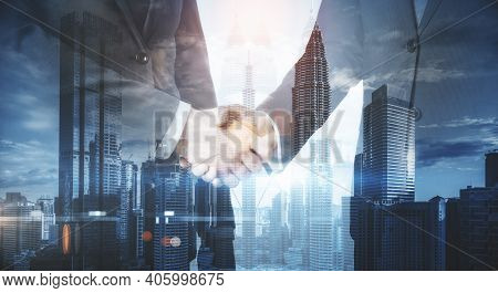Sode View Of Businessmen Shaking Hands On Blurry City Background. Teamwork And Success Concept. Mult