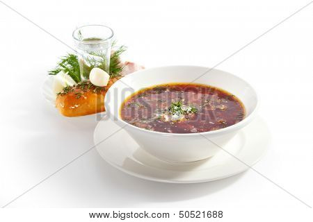 Beetroot and Cabbage Soup with Meat Slice. Garnished with Ham, Lard, Onion, Garlic and Vodka