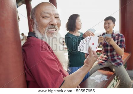 Chinese Family Playing Card In Jing Shan Park