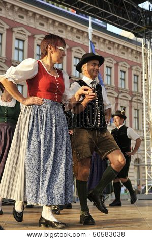 ZAGREB,CROATIA - JULY 19: Members of folk groups Oberes Murtal from Austria during the 47th International Folklore Festival in center of Zagreb,Croatia on July 19,2013