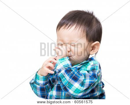 Asia baby boy suck finger into mouth