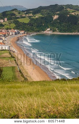 Panoramic View Of Zarautz With Guetaria On The Background On A Bright Sunny Summer Day.