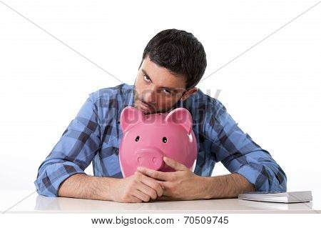 Sad Worried Man In Stress With Piggy Bank In Bad Financial Situation