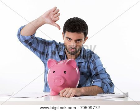 Sad Worried Man In Stress With Piggy Bank In Bad Financial Situation