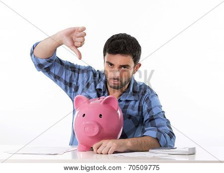 Sad Worried Man In Stress With Piggy Bank In Bad Financial Situation