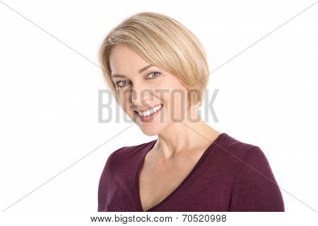 Portrait: Isolated Face Of A Smiling Attractive Older Blond Woman.