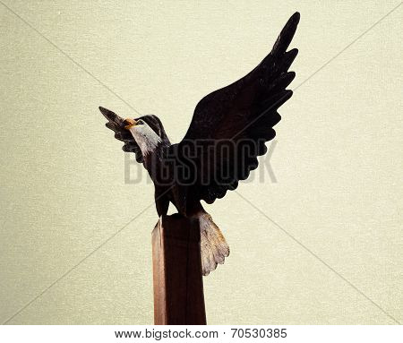 Eagles Wood Statue On Vintage Blackground