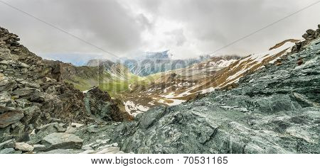 Panoramic View Of A Mountain Valley From A Ridge