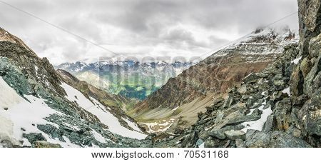 Panoramic View Of A Mountain Valley From A Ridge