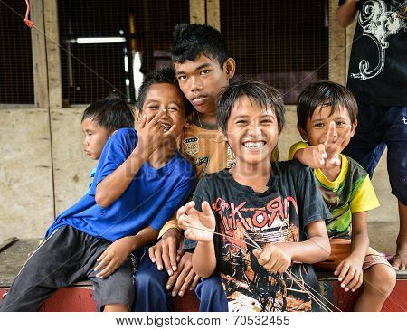 poor children playing happily together