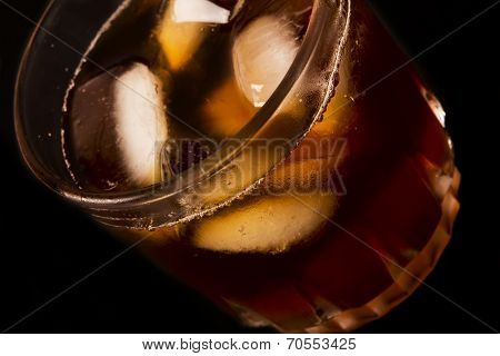 glass with dark liquid