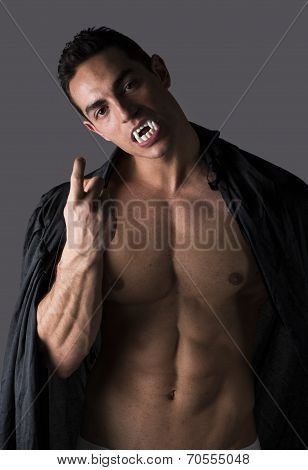 Naked Muscular Fit Young Man In Briefs Posing As A Vampire Or Dracula
