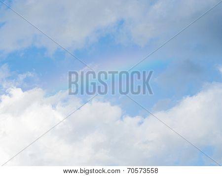 Rainbow In Blue Sky
