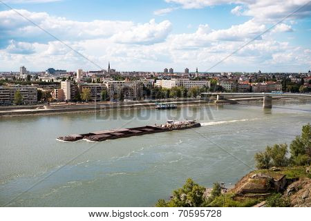Containership or barge on the river