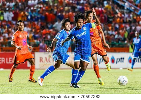 Sisaket Thailand-august 13: Yuttana Chaikaew Of Ptt Rayong Fc. (blue) In Action During Thai Premier