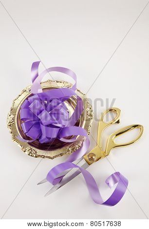 cutting purple ribbon -open ceremony concept