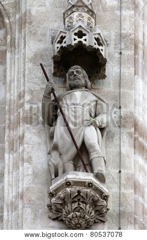 ZAGREB, CROATIA - SEPT 26: Statue of Saint Roch on the portal of the cathedral dedicated to the Assumption of Mary and to kings Saint Stephen and Saint Ladislaus in Zagreb on Sept 26, 2013.