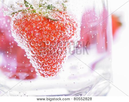 Strawberry In Mineral Water With Boobles
