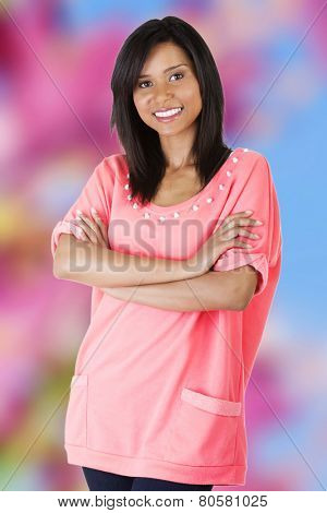 Happy tanned woman looking at the camera