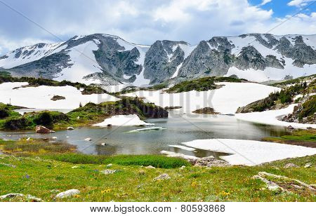 Snowy Range Mountains And Apline Lake In Medicine Bow, Wyoming In Summer