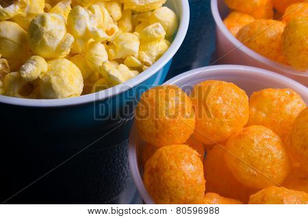 Popcorn And Cheesepuffs In Plastic Cups