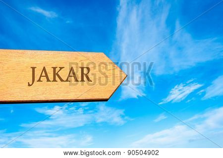 Blank Wooden Arrow Over Clear Blue Sky With Copy Space