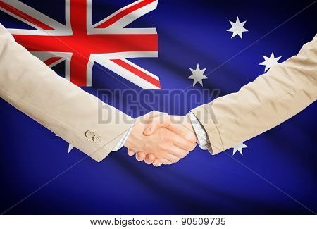 Businessmen Handshake With Flag On Background - Australia