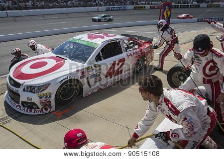 Richmond, VA - Apr 26, 2015:  Kyle Larson (42) brings his race car in for service during the Toyota Owners 400 race at the Richmond International Raceway in Richmond, VA.