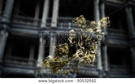 Aladdin's magic lamp in smoke on gothic halloween background