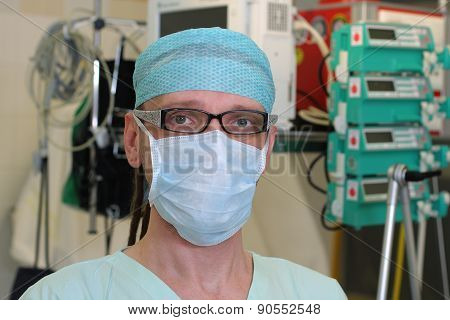 Portrait Of  Male Nurse Icu  In A Green Uniform.